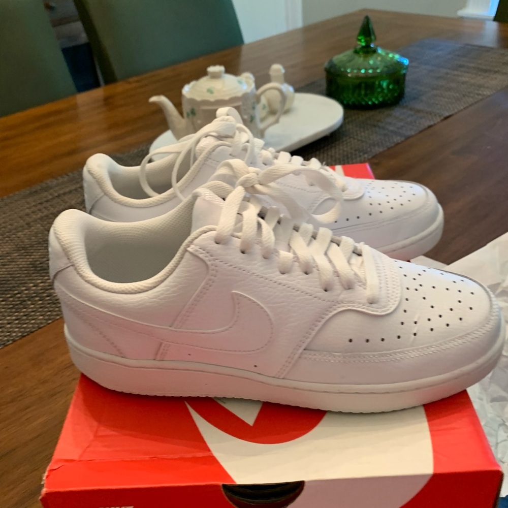 Women’s Nike court vision, low tennis shoes.